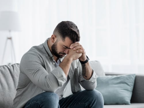 Man struggling with anxiety disorder