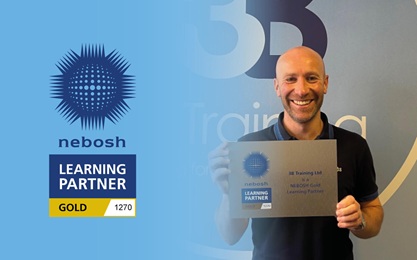 Mathew Bewley, Managing Director at 3B Training holding NEBOSH Gold Learning Partner plaque