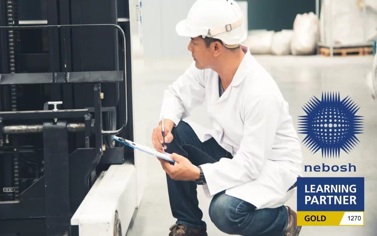 Worker carrying out health and safety after NEBOSH General course