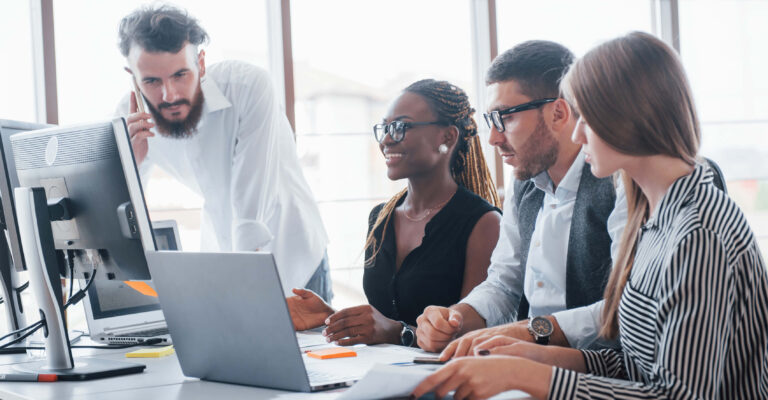 Employees talking in the office