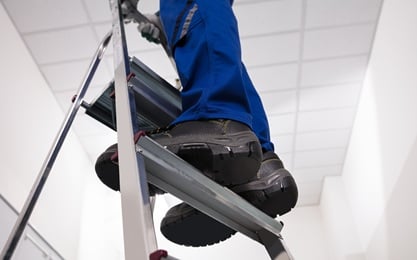 Individual working at heights after completing the Ladder Safety Online Training