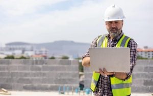 Man becoming aware of Building Safety Regulations by taking BSA eLearning