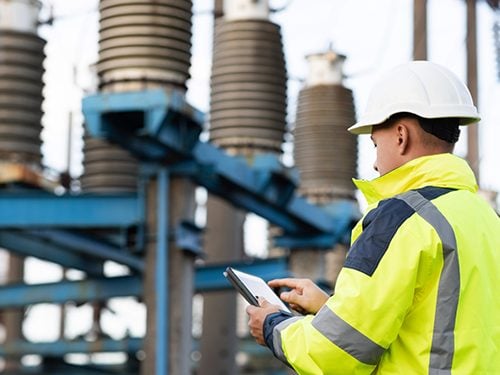 A utility worker performing duties on-site after obtaining their EUSR card.