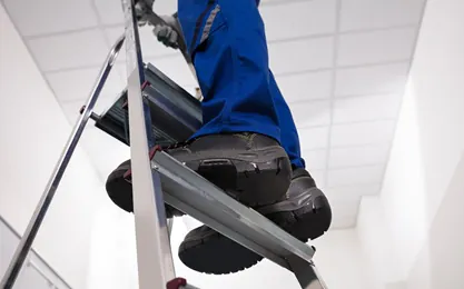 Individual working at heights after completing the Ladder Safety Online Training