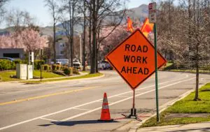 Road sign warns of road work ahead 