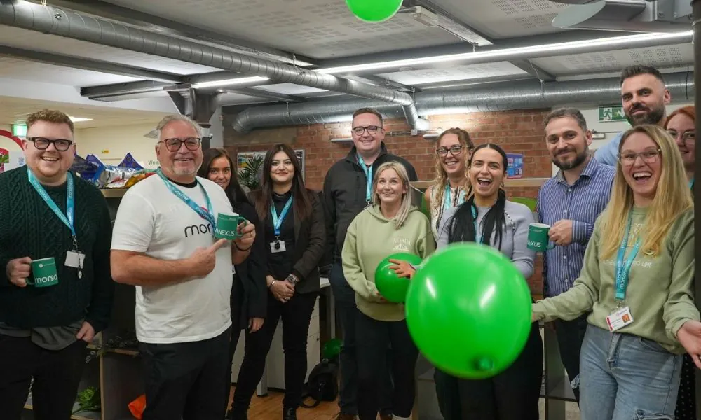 Team celebrating Nexus rebrand